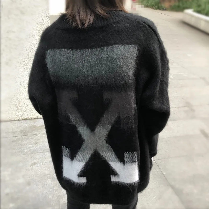 ♻️💯Reference model picture for the upper body❤️New top tested version OFFWHITE (OW) Gradient Mohair Striped Arrow Sweater Hoodie Gradient Rendering Arrow Couple Sweater Mohair sweater ow family will release every year🛒 The same style and ever-changing colors, really no girl does not love it, it is super suitable for wearing under a down jacket in winter, and will not be bloated! If the lower body is missing, their favorite os version🙋🏻‍♀️ intuitively adds natural softness and fairy beauty effect, which is the best choice! The upper body is lightweight and does not weigh down the body while keeping warm. The sleeves and the gradient arrow parts on the back are repeatedly patterned until the gradient level is satisfied before large-scale products are released. The craftsmanship is extremely demanding. Each sweater is woolen at least ten times to give it a plush, thick feel and good fluffiness! ✅ Fabric composition: 50% mohair 32 spandex 18% wool, three-level anti-pilling Color: black and white gradient Sizes Mohair is lighter and softer, so be careful not to machine wash it, not machine washable! ! emphasize! !  ⚠️Hand wash with warm water and cold water P:440